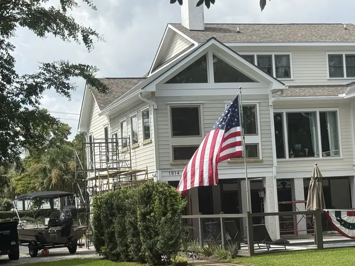 Sullivan's Island: second-story porch enclosure and new windows