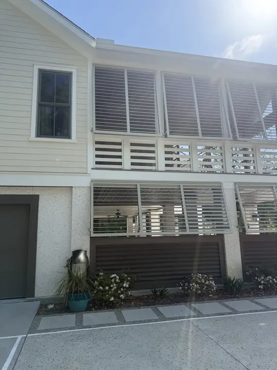 Sullivan's Island: louvered porch enclosure, finished
