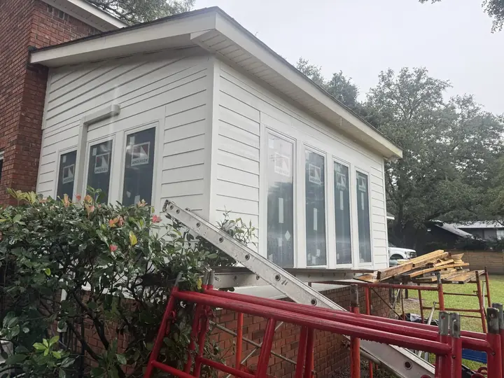 Sunroom conversion on a brick home