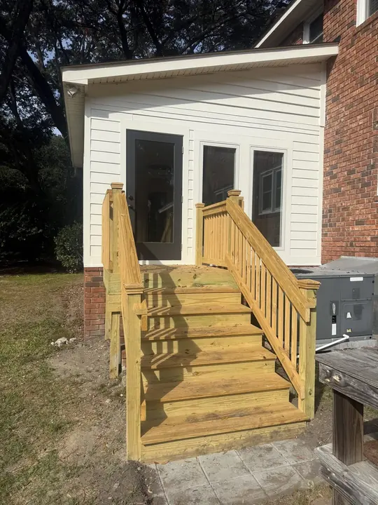 New sunroom with pressure-treated steps