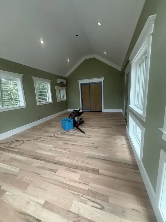 Finished sunroom with new hardwood floors